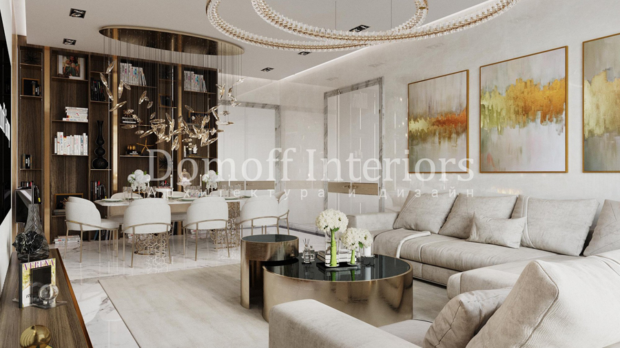 Светлая гостиная-столовая с золотистым декором и мебелью в оттенке шампань