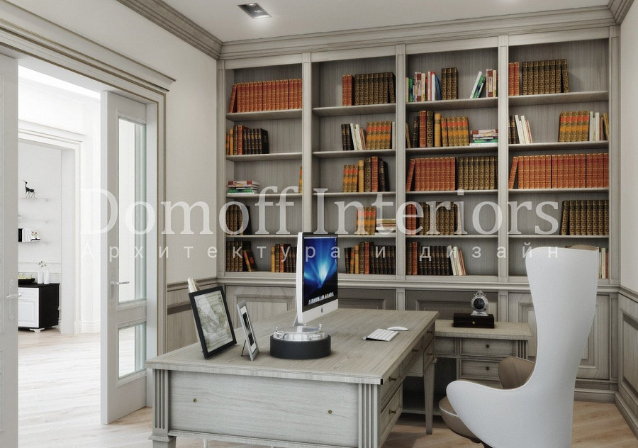 Классический кабинет в серых тонах эстетично украшен старинными многотомными изданиями на стеллаже