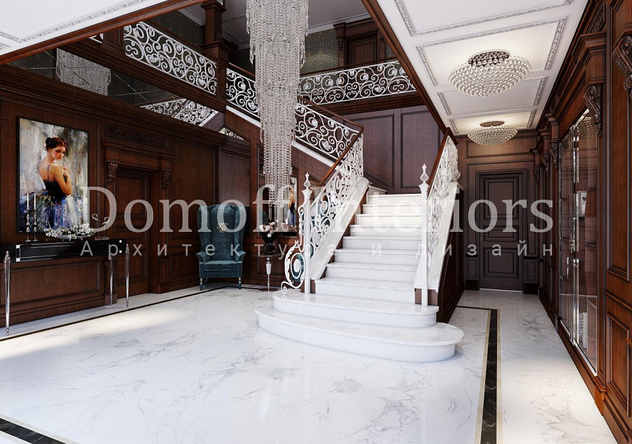 Классический холл с широкой лестницей профессионально декорирован окрашенными в белый цвет коваными элементами