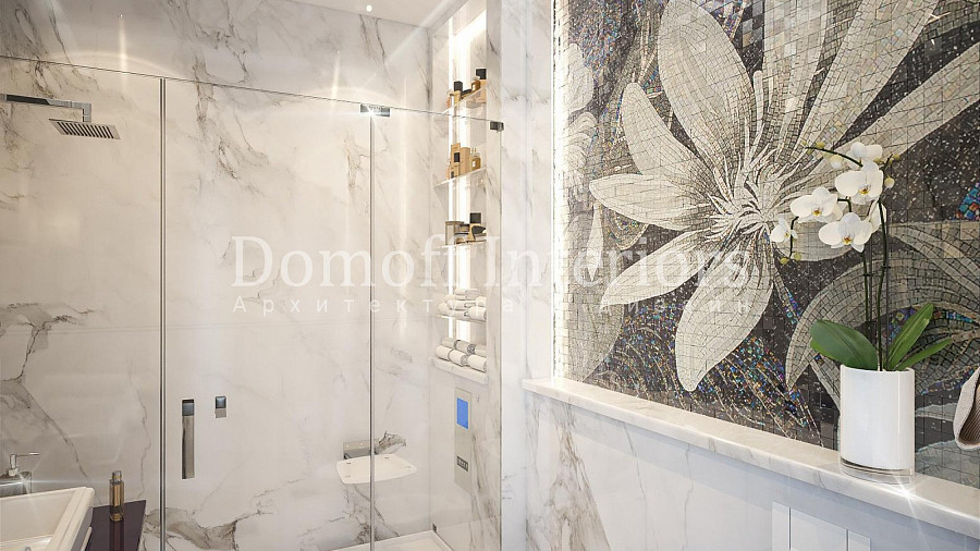 Панно из мозаики с большим цветком черно-белого цвета на стене в ванной